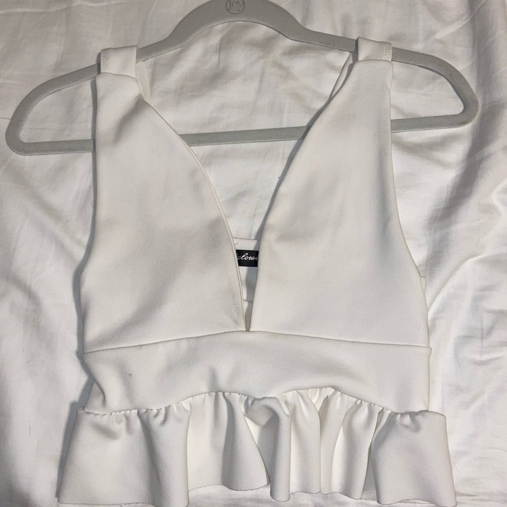 Cropped white peplum top